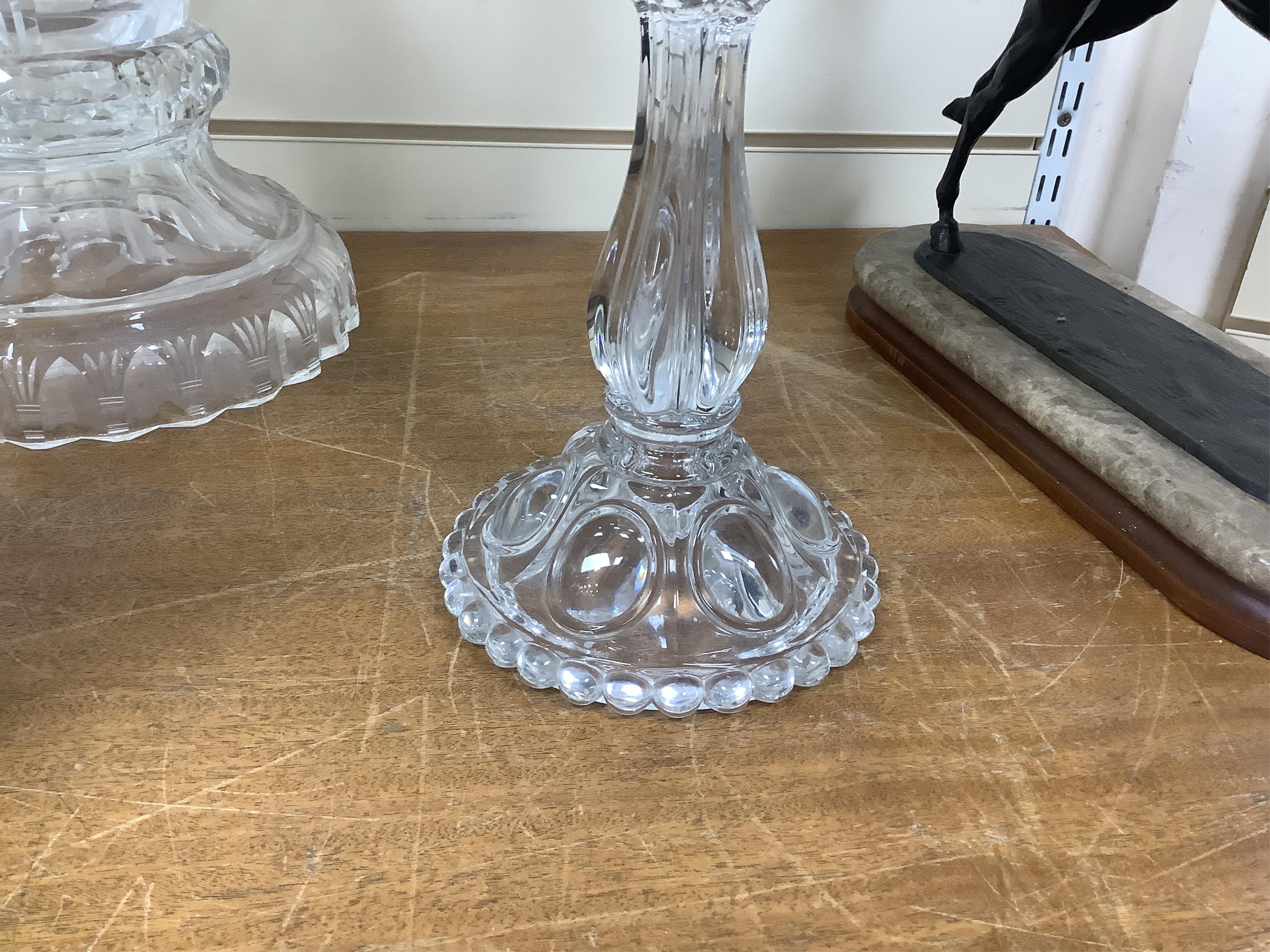 A Baccarat style moulded glass five branch candelabrum (lacking one arm), 58cm high. Condition - good, lacking one arm